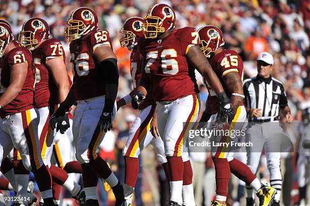 The Washington Redskins offense comes up to the line of scrimmage during the game against the Denver Broncos at FedExField on November 15, 2009 in...