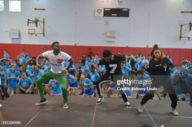 Jason Derulo joins choreographer Jeremy Strong to teach youth choreography to Jason Derulo's new single "Colors" at Boys & Girls Club of Broward...