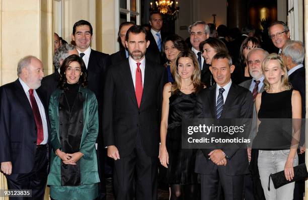 Prince Felipe of Spain and Princess Letizia of Spain pose with guests ahead of the Francisco Cerecedo Journalism Award ceremony at The Ritz Hotel on...