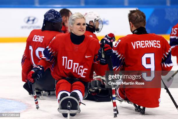 Lena Schroeder of Norway celebrate with her team mates after the Ice Hockey Preliminary Round - Group A game between Norway and Sweden during day...