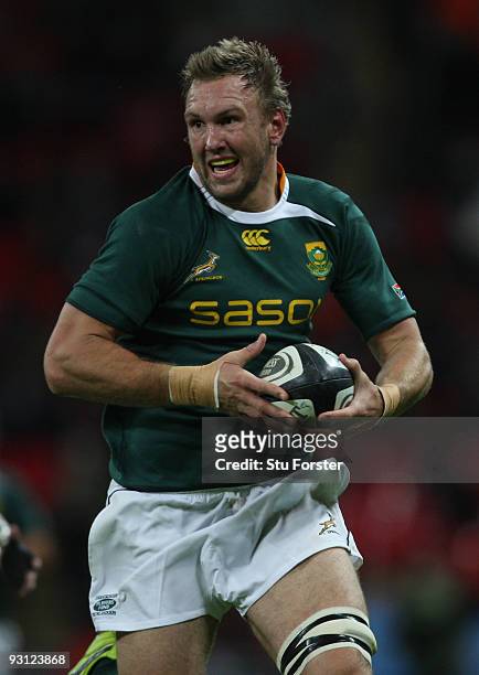 Andries Bekker of South Africa charges through the Saracens defence during the friendly match between Saracens and South Africa at Wembley Stadium on...