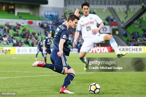 James Donachie of the Victory kicks the ball past Kei Chinen of Kawasaki Frontale during the AFC Asian Champions League match between the Melbourne...