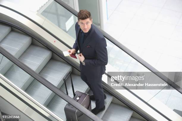 Robert Lewandowski of FC Bayern Muenchen arrives at Munich international airport 'Franz Josef Strauss' prior their team flight for the UEFA Champions...