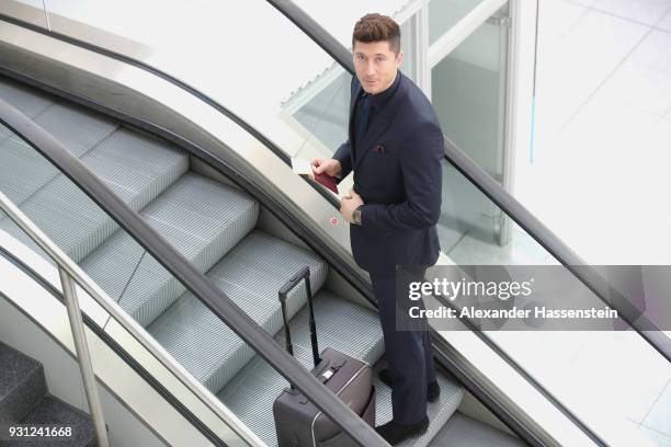 Robert Lewandowski of FC Bayern Muenchen arrives at Munich international airport 'Franz Josef Strauss' prior their team flight for the UEFA Champions...