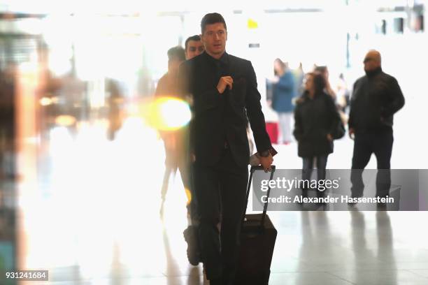 Robert Lewandowski of FC Bayern Muenchen arrives at Munich international airport 'Franz Josef Strauss' prior their team flight for the UEFA Champions...