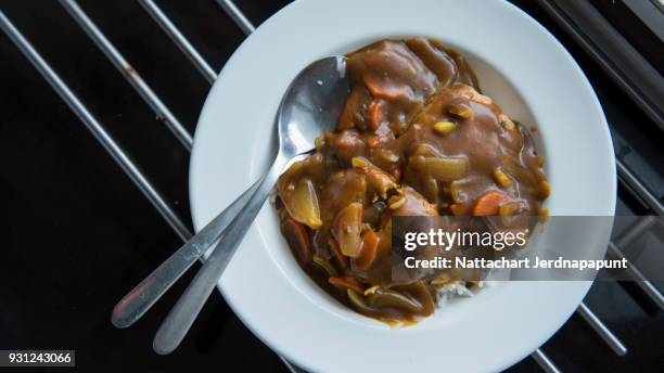 japanese curry rice prepare for meal - yōshoku stockfoto's en -beelden