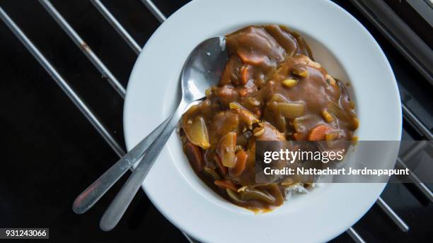 japanese curry rice prepare for meal - japanese curry stock pictures, royalty-free photos & images