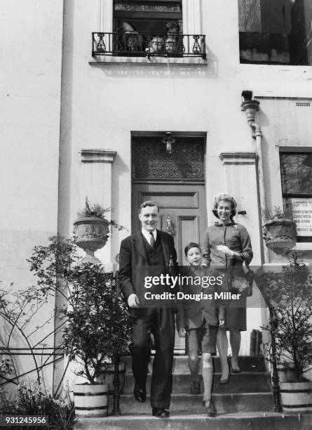 Politician Anthony Wedgwood Benn leaves his home in Holland Park, London, for the House of Commons, accompanied by his wife Caroline and eldest son...