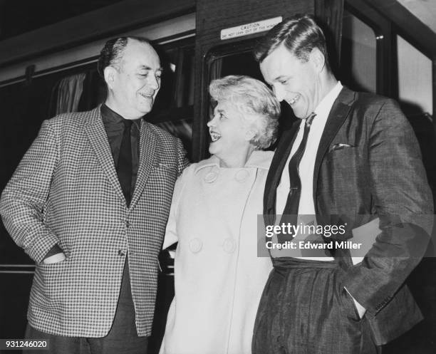 From left to right, Labour politicians Tom Driberg , Jennie Lee and Anthony Wedgwood Benn leave London on their way to the Labour Party Conference in...