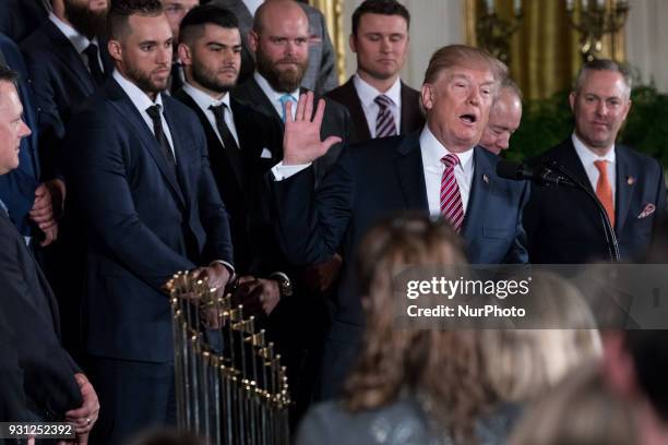 President Donald Trump welcomes the Houston Astros to the White House to celebrate their World Series Championship, in the East Room, on Monday,...