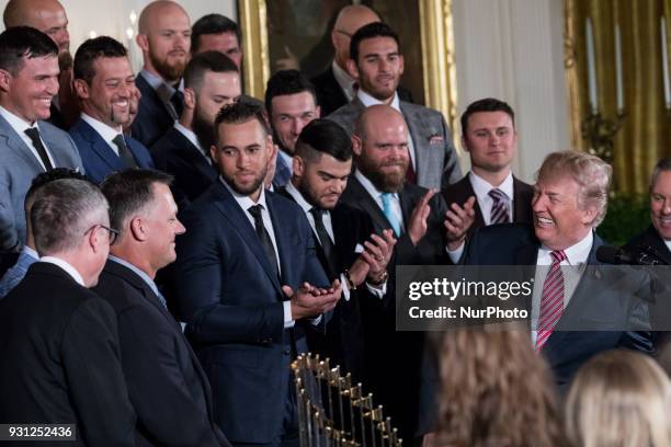 President Donald Trump welcomes the Houston Astros to the White House to celebrate their World Series Championship, in the East Room, on Monday,...