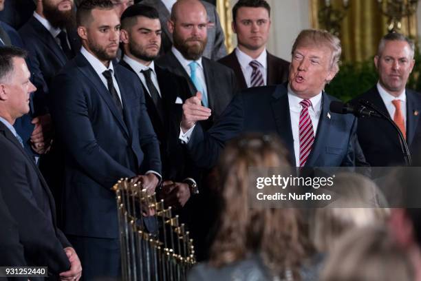 President Donald Trump welcomes the Houston Astros to the White House to celebrate their World Series Championship, in the East Room, on Monday,...