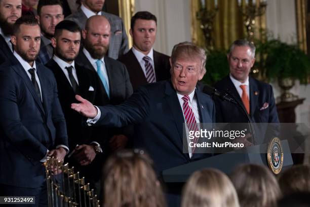 President Donald Trump welcomes the Houston Astros to the White House to celebrate their World Series Championship, in the East Room, on Monday,...