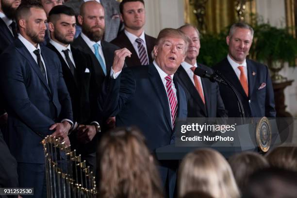 President Donald Trump welcomes the Houston Astros to the White House to celebrate their World Series Championship, in the East Room, on Monday,...