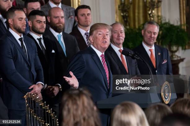 President Donald Trump welcomes the Houston Astros to the White House to celebrate their World Series Championship, in the East Room, on Monday,...