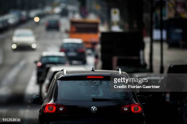 Cars drive on a city street on March 06, 2018 in Berlin, Germany.