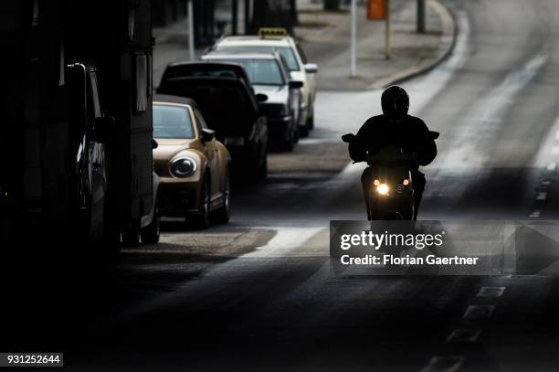 Scooter drives on a city street on March 06, 2018 in Berlin, Germany.