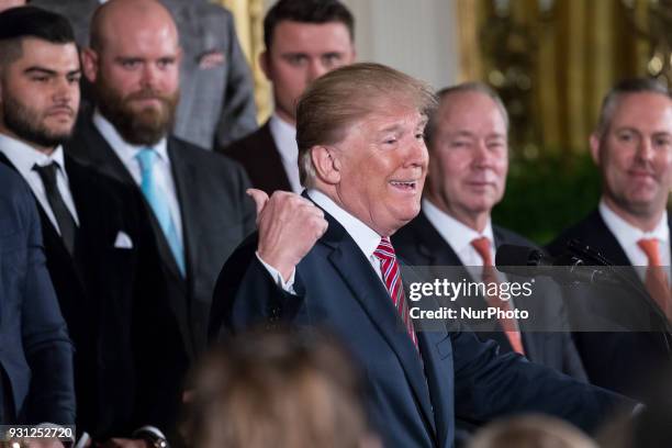 President Donald Trump welcomes the Houston Astros to the White House to celebrate their World Series Championship, in the East Room, on Monday,...