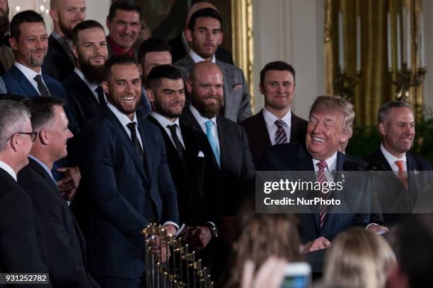 President Donald Trump welcomes the Houston Astros to the White House to celebrate their World Series Championship, in the East Room, on Monday,...