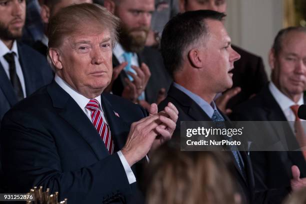 President Donald Trump welcomes the Houston Astros to the White House to celebrate their World Series Championship, in the East Room, on Monday,...