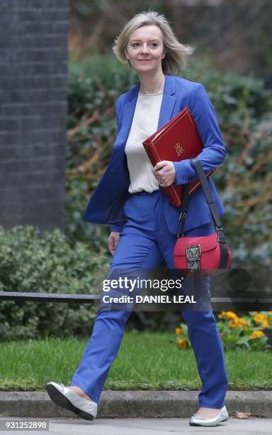 Britain's Chief Secretary to the Treasury Liz Truss arrives at 10 Downing Street in central London on March 13, 2018 to attend the weekly meeting of...