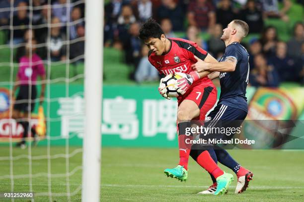 Kawasaki Frontale Goalkeeper Jung Sung-ryong saves a goal James Troisi of the Victory during the AFC Asian Champions League match between the...