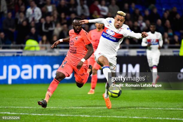 Mariano of Lyon and Ismael Diomande of Caen during the Ligue 1 match between Olympique Lyonnais and SM Caen at Parc Olympique on March 11, 2018 in...