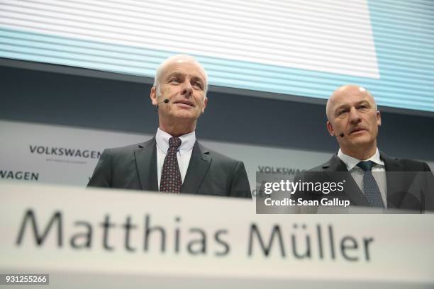 Matthias Mueller , Chairman of German automaker Volkswagen AG, and VW Chief Financial Officer Frank Witter arrive for the company's annual press...