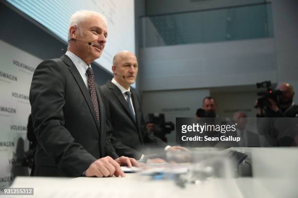 Matthias Mueller , Chairman of German automaker Volkswagen AG, and VW Chief Financial Officer Frank Witter arrive for the company's annual press...