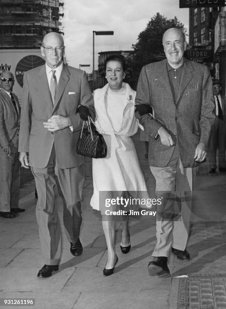 From left to right, director George Abbott , American actress Joan Bennett and actor Fred Clark who are collaborating in the comedy 'Never Too Late'...