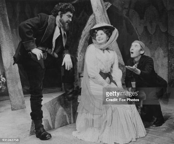From left to right, actors Joss Ackland, Ingrid Bergman and Kenneth Williams during a rehearsal at the Theatre Royal in Brighton for the George...