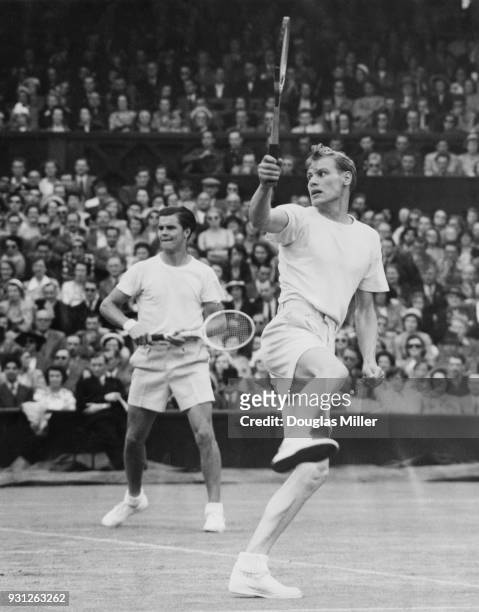 Swedish tennis players Lennart Bergelin and Sven Davidson in a doubles match against Budge Patty and Ham Richardson during the Wimbledon...