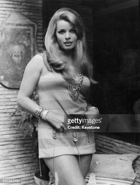 Austrian actress Senta Berger in Rome for the filming of 'If It's Tuesday, This Must be Belgium', 26th August 1968. She is dressed for her part in...