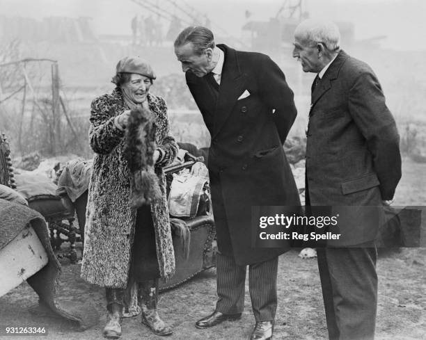 Sir Rupert De la Bère , the Lord Mayor of London, visits areas of Canvey Island in Essex which were affected by the North Sea flood, and provides...