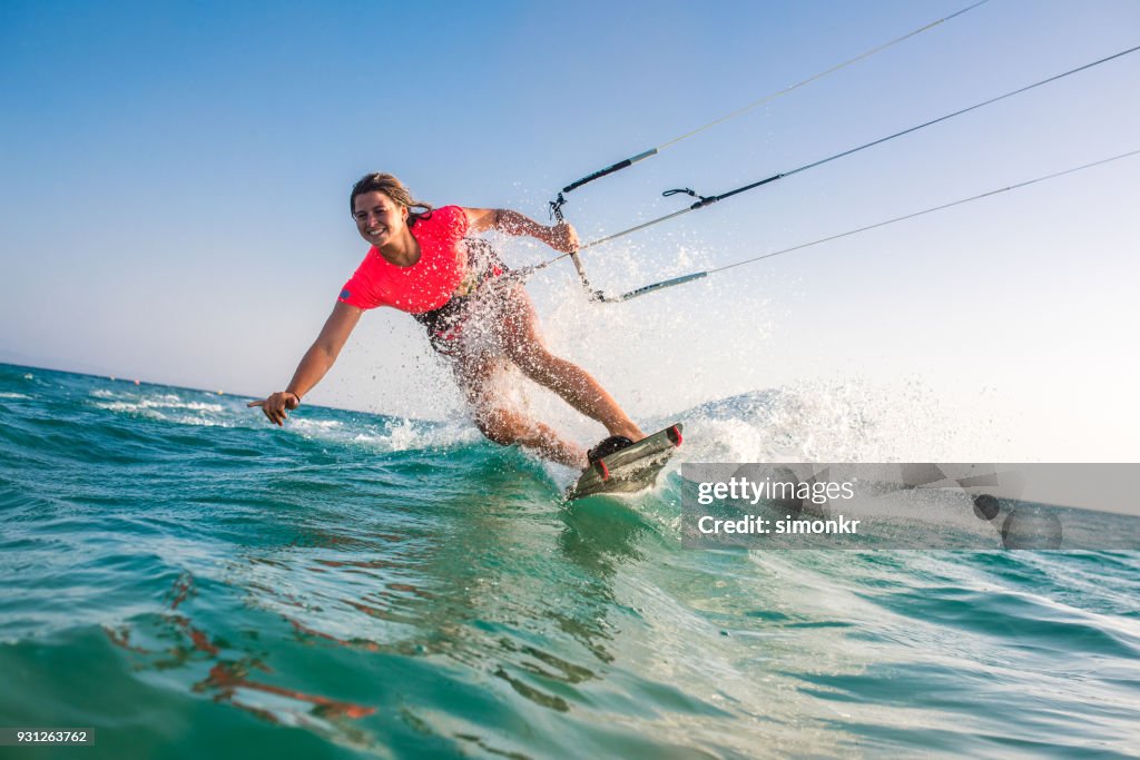 Woman doing kitesurfing