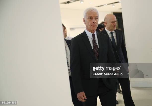 Matthias Mueller , Chairman of German automaker Volkswagen AG, and VW Chief Financial Officer Frank Witter arrive for the company's annual press...