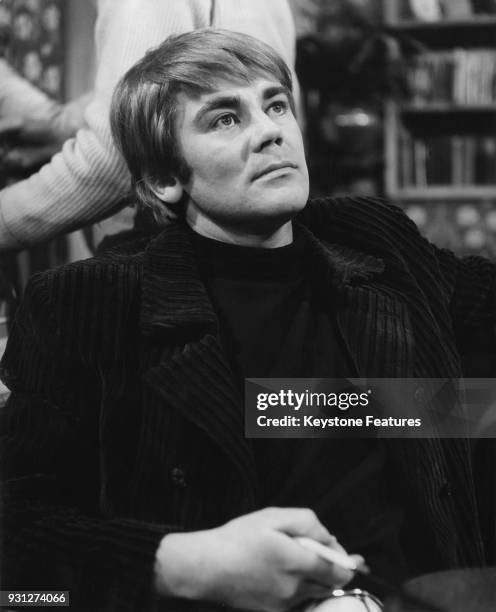 English actor Anthony Booth, or Tony Booth, who plays Mike Rawlins in the BBC television series 'Till Death Us Do Part', during rehearsals for the...