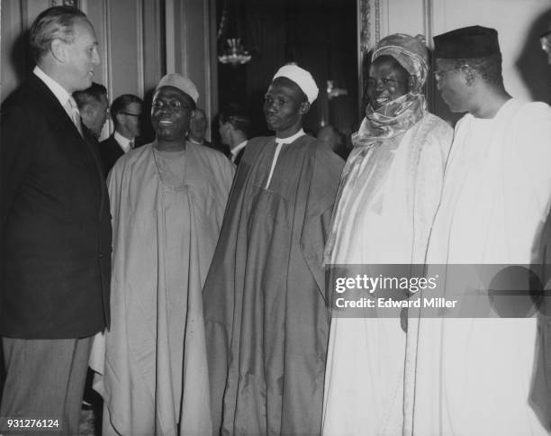 British Conservative politician Alan Lennox-Boyd , the Secretary of State for the Colonies, chats with Nigerian premiers at the opening session of...