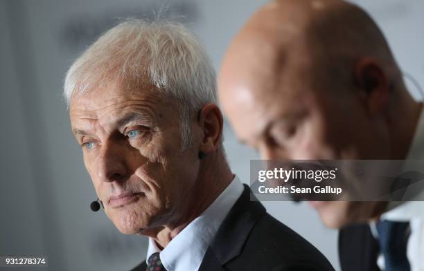 Matthias Mueller , Chairman of German automaker Volkswagen AG, and VW Chief Financial Officer Frank Witter attend the company's annual press...