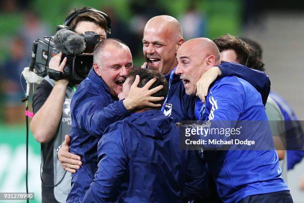 Victory head coach Kevin Muscat celebrates a goal by Kosta Barbarouses of the Victory with his assistants during the AFC Asian Champions League match...