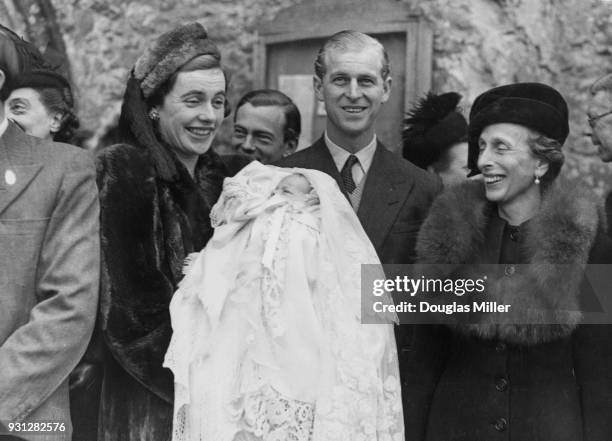 Lieutenant Mountbatten, the fiancé of Princess Elizabeth, attends the christening of Norton Knatchbull, son of the 7th Baron Brabourne and Patricia...