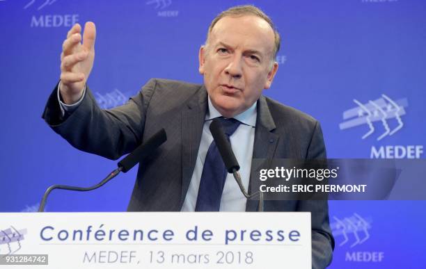 Head of the French employers' federation Medef, Pierre Gattaz speaks during a monthly press conference at the Medef headquarters in Paris on March...