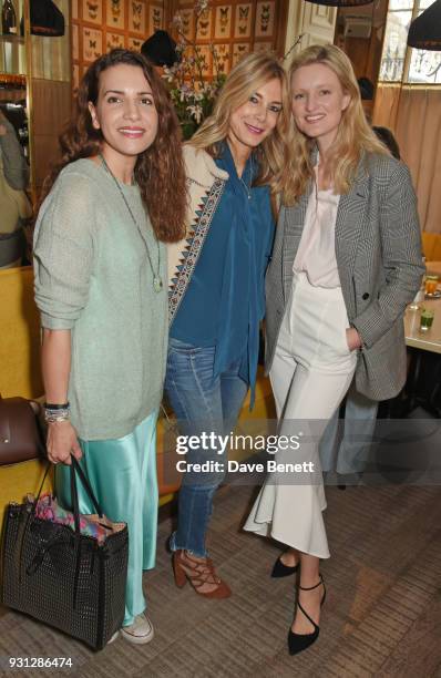 Racil Chalhoub, Kim Hersov and Candice Lake attend the Espie Roche launch breakfast at The Chess Club on March 13, 2018 in London, England.