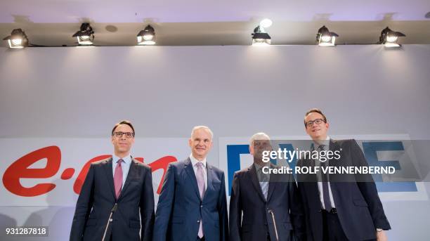 Rolf Martin Schmitz , chairman of German energy supplier RWE, RWE CFO Markus Krebber , Johannes Teyssen , CEO of German utility company EON, and EON...