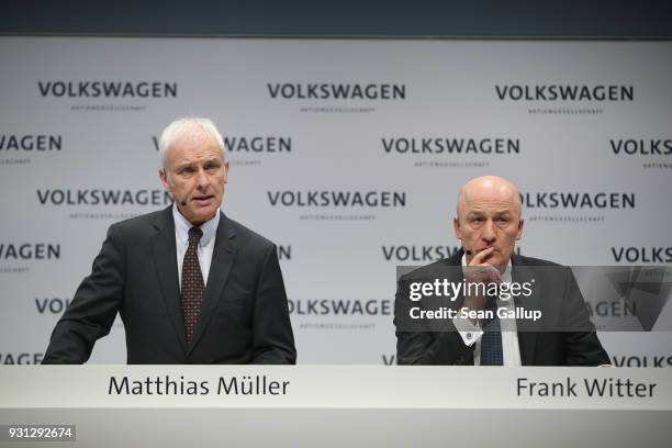 Matthias Mueller , Chairman of German automaker Volkswagen AG, and VW Chief Financial Officer Frank Witter attend the company's annual press...