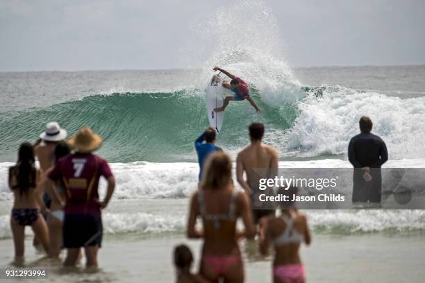 Local Gold Coast surfer Joel Parkinson slashes through the wave during his heat in the Quiksilver Pro Gold Coast Round 2, on the Gold Coast....