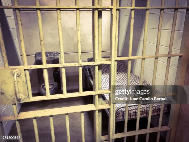 jail cell with the door close - death row stock pictures, royalty-free photos & images