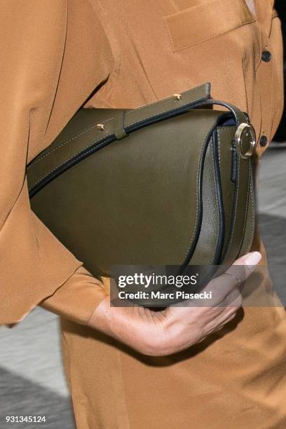 Victoria Beckham, handbag detail, is seen at Gare du Nord station on March 13, 2018 in Paris, France.