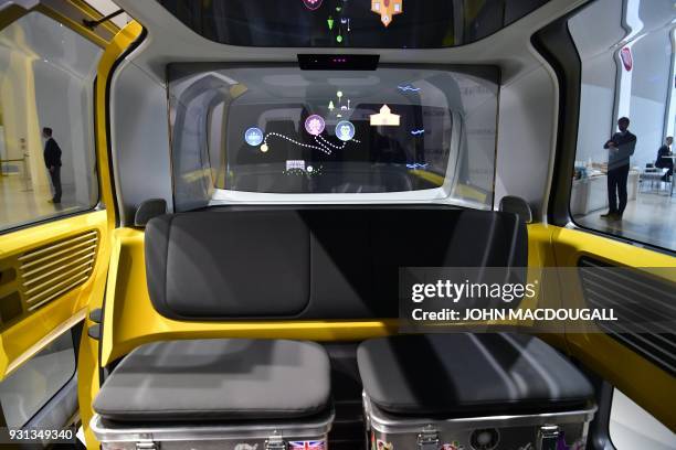 Volkswagen autonomous "Sedric" vehicle is on display at VW's showrooom, where the German car maker is holding its annual press conference, in Berlin...