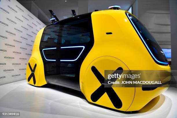 Volkswagen autonomous "Sedric" vehicle is on display at VW's showrooom, where the German car maker is holding its annual press conference, in Berlin...